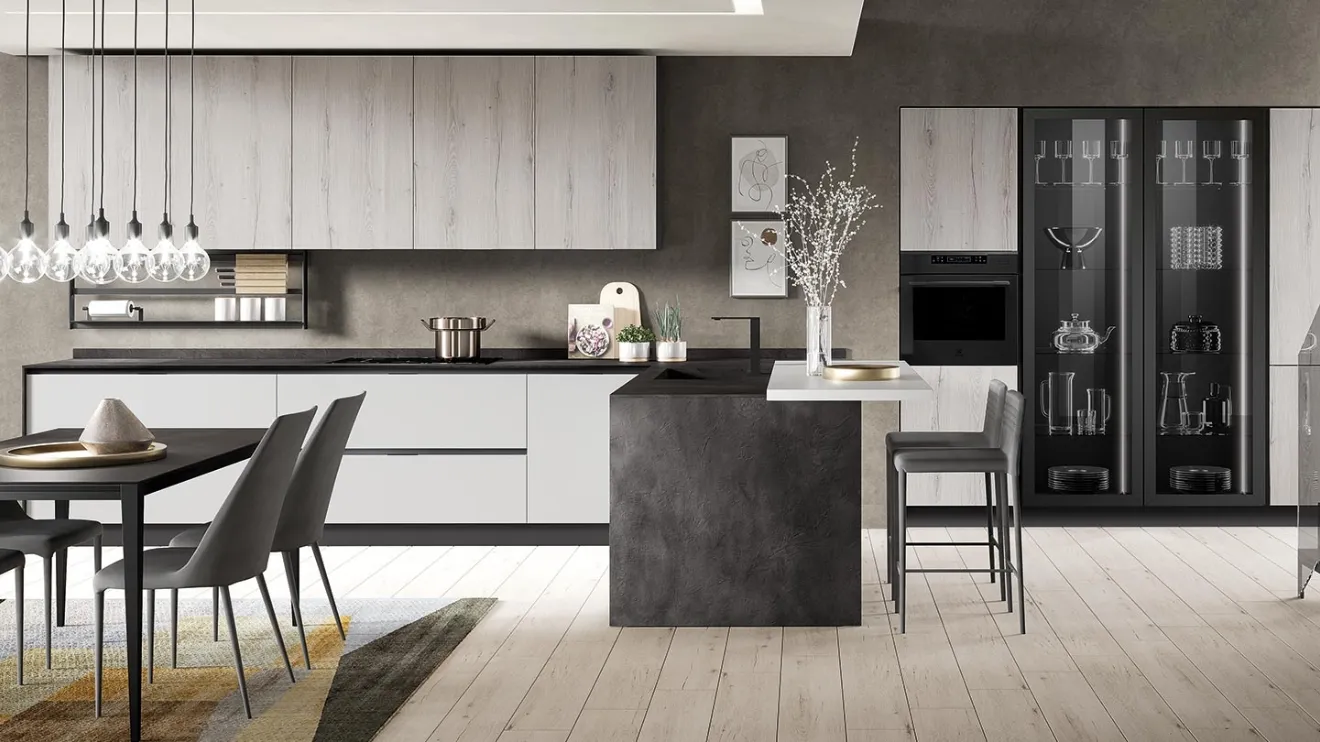 Cucina Moderna con penisola Diva in Pet finitura Ghiaccio opaco e laminato Rovere Grigio di Evo Cucine